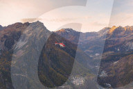 Aerial view of helicopter in flight on Primolo, Valmalenco, Valtellina, Lombardy, province of Sondrio, Italy