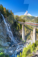 Gornergrat Bahn train on viaduct with Matterhorn on background, Zermatt, canton of Valais, Switzerland