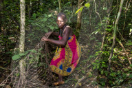 Baka pygmies on their way to go nethunting, in the Unesco world heritage sight Dzanga-Sangha Special Reserve, Central African Republic