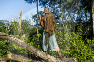 Baka pygmie man hunting in the jungle in the Unesco world heritage sight Dzanga-Sangha Special Reserve, Central African Republic