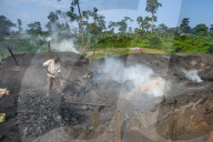 Coal production out of wood, Libongo, deep in the jungle of Cameroon