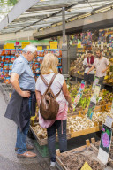 People browsing in Bloemenmarkt, Amsterdam, Netherlands