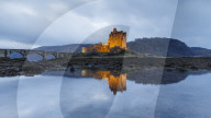 Dusk at Eilean Donan (Eilean Donnan) Castle in Dornie, Highlands, Scotland, United Kingdom, Europe