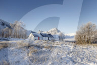 A winter scene at Black Rock cottage and Buachaille Etive Mor on Rannoch Moor, Highlands, Scotland, United Kingdom, Europe