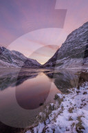 Loch Achtriochtan in winter with snow-capped mountains and reflections, Glencoe, Highlands, Scotland, United Kingdom, Europe