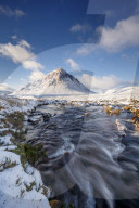 A wintery scene at Buachaille Etive Mor and River Coupall, Glencoe, Highlands, Scotland, United Kingdom, Europe.