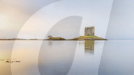 Castle Stalker on its own island in Loch Linnhe surrounded by mist, Argyll, Scottish Highlands, Scotland, United Kingdom, Europe