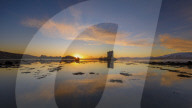 Sunset at Castle Stalker, a keep on its own island in Loch Linnhe, Argyll, Scottish Highlands, Scotland, United Kingdom, Europe.