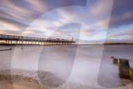 The evening sun hits Herne Bay Pier, Herne Bay, Kent, England, United Kingdom, Europe