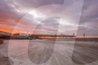 Dramatic skies over Herne Bay Pier at dusk, Herne Bay, Kent, England, United Kingdom, Europe
