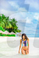 Scenic at Conrad Maldives Rangali Island with model.