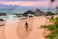 Model just strolling the beach before sunset at Kumu Beach.