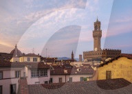 Looking over the rooftops of the historic centre of Florence to the Palazzo Vecchio at dusk