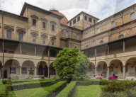 The formal cloister garden with clipped box hedges of the San Lorenzo church in Florence.