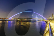 Tolerance Bridge, a pedestrian bridge spanning Dubai Water Canal illuminated at night, Business Bay, Dubai, United Arab Emirates