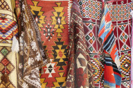 Colourful rugs and carpets for sale in Al Fahidi Historic Neighbourhood, Bur Dubai, Dubai, United Arab Emirates