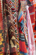 Colourful rugs and carpets for sale in Al Fahidi Historic Neighbourhood, Bur Dubai, Dubai, United Arab Emirates