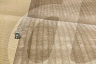 A farmer ploughing chalk hills on the East Yorkshire Wolds