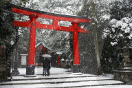 Heavy snow falling on Fushimi Inari shrine, Kyoto, Japan.