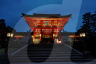 Fushimi Inari shrine entrance gate at dusk, Kyoto, Japan.