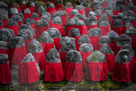 Old jizo statues with red bibs, Risho-in temple, Kyoto.