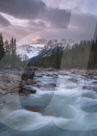 Sunrise and glacial blue rushing waters at Mistaya Canyon, Banff National Park, Alberta, Canada