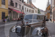 Antique car and Pest-Buda Restaurant near the Fisherman's Bastian, Budapest, Hungary
