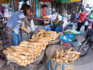 Baguettes being sold at market, Siem Reap, Cambodia, Southeast Asia