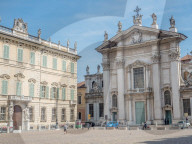 Manuta's Cathedral of Saint Peter on the left and the Bishop's palace on the right, Mantua, Italy, Europe
