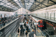 Commuters Earl's Court Tube station servicing the District and Circle lines at these platforms