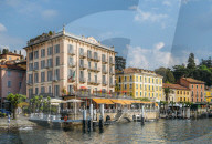 Bellagio waterfront with traditional buildings and terraces, Lake Como, Italy