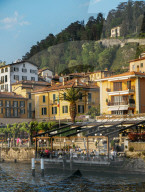 Traditional buildings and restaurant terraces in Bellagio, Lake Como, Italy