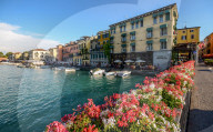 Floral display at entrance to Peschiera del Garda in Veneto, Italy on a summer day