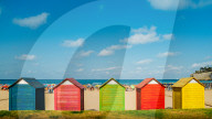 Colourful wooden huts at Peniscola beach, Spain