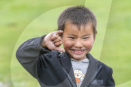 Portrait of a Mongolian nomadic little boy. North Hangay province, Mongolia.