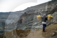 Sulphur miner of Ijen volcano, Eastern Java, Indonesia