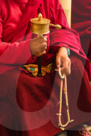 Tibetan Buddhist monk at Losar (Tibetan New Year) in the Dalai Lama Temple, McLeod Ganj, Dharamsala, India