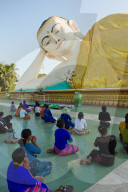 Reclining Buddha and Buddhist devotees of Bagan, Myanmar