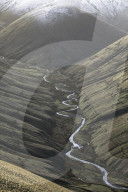 View down Langdale Valley to snow capped Cobles in winter in the Howgill Fells near Sedbergh, Cumbria, UK