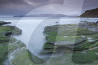 The Isle of Rum from Singing Sands on the Isle of Eigg, Small Isles, Inner Hebrides, Scottish Highlands, Scotland, UK