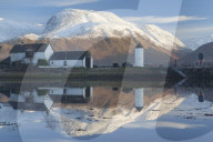 View towards the snow capped peak of Ben Nevis across Loch Linnhe from Corpach near Fort William Lochaber Highlands Scotland UK