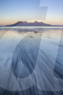 The Isle of Rum from Singing Sands on the Isle of Eigg, Small Isles, Inner Hebrides, Scottish Highlands, Scotland, UK