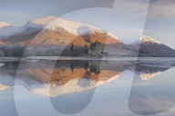 The ruins of Kilchurn Castle seen across Loch Awe at sunrise in winter Kilchurn Bay Loch Awe Argyll and Bute Highlands Scotland