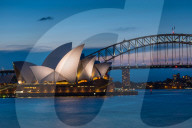 Sydney Opera House and Harbour bridge after sunset. Sydney, New South Wales, Australia.