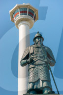 Busan Tower and statue of Admiral Yi Sun-shin at Yongdusan Park, Busan, South Korea.