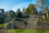 Ruins of the Abbey of Bury St Edmunds, historic Benedictine monastery, with St Edmundsbury Cathedral. Suffolk, England, UK.
