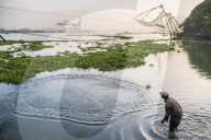 Traditional Chinese fishing nets at sunrise, Fort Kochi (Cochin), Kerala, India
