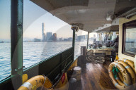 Star Ferry at sunrise with Hong Kong Island behind, Hong Kong, China