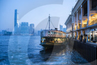 Star Ferry leaving Hong Kong Island, towards Kowloon at night, Hong Kong, China