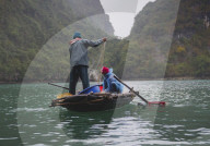 Fishermen in the Lan Ha Bay, Cat Ba Island, a typical Karst landscape in Vietnam